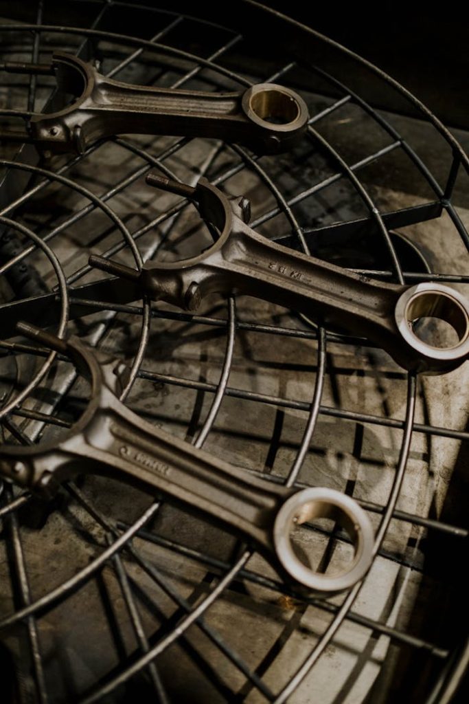 Detailed image of metal wrenches on a circular gear, ideal for repair and mechanical themes.